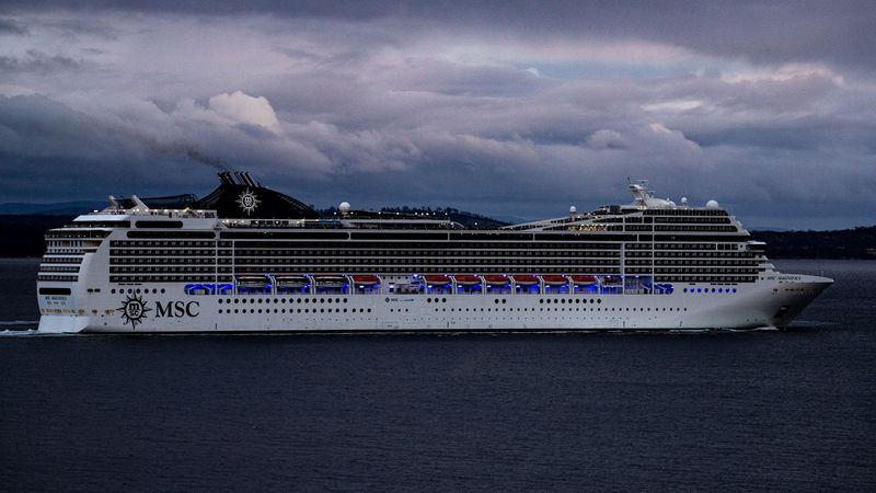 MSC Magnifica under way at dusk