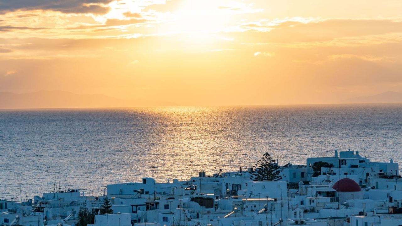 The white town of Mykonos at sunset
