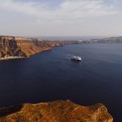 A cruise ship crossing the caldera of Santorini