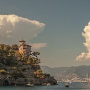 A villa on a wooded headland above the sea at Portofino