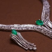An emerald and diamond necklace