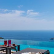 A resort infinity pool above the sea